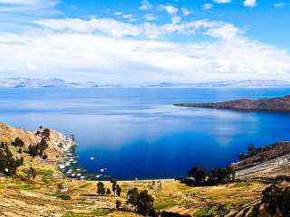 Departure to Bolivia and departure for a cruise on Lake Titicaca.