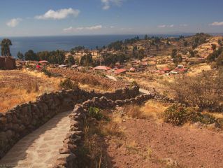 Visit the island of Taquile and return to Puno.