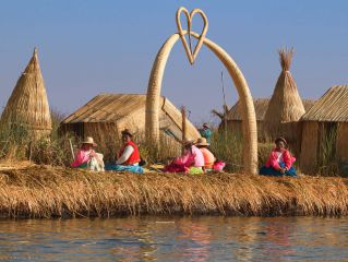Visit the Uros floating islands and Taquile